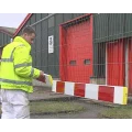 Red and white road barrier.