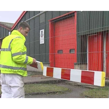 Red and white road barrier.